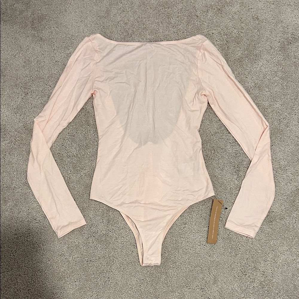 BRAND NEW Reformation Light Pink Long Sleeve Open Back Bodysuit